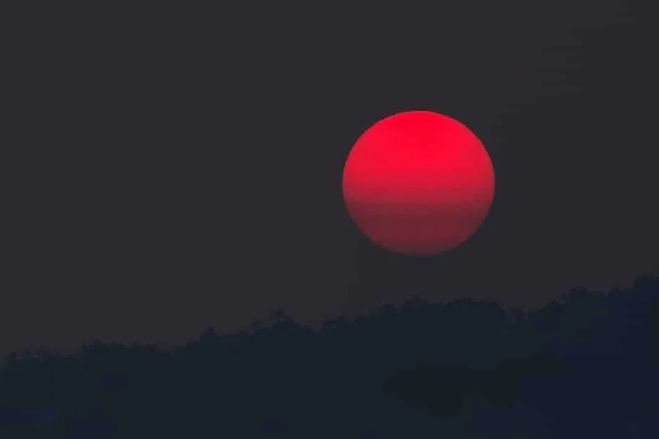 red moon during night time
