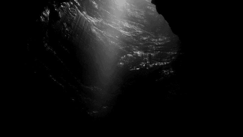 Decorative image of a cave in black and white. Color meanings in different cultures.
