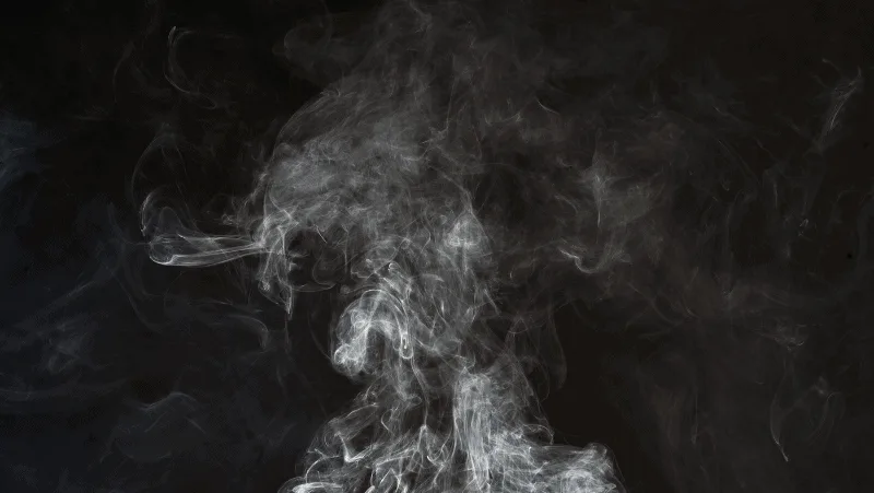 Decorative image of black smoke.