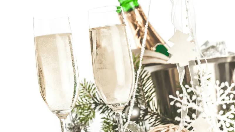 Champagne and Champagne glasses with new year's decor