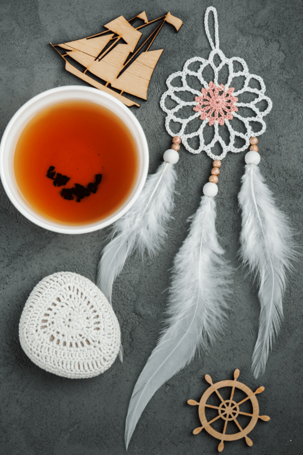 Tea with a dream catcher, boat, and steering wheel