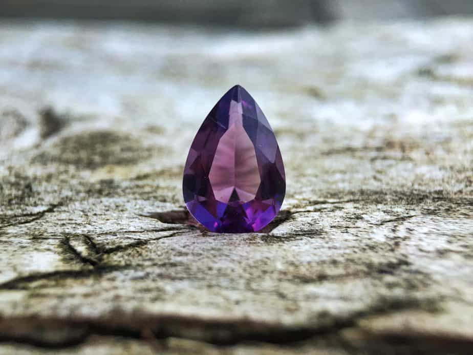 Purple crystals meanings. teardrop shape amethyst stone
