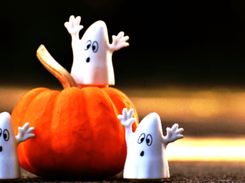 Ghosts on pumpkin Decorative Image | Samhain Activities For Solitary Witches | Thinking of Samhain activities to do as a solitary witch can be hard!