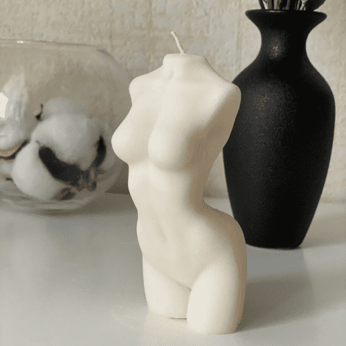 Female figure candle for witchcraft