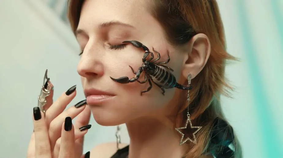 photo of scorpion on woman s face