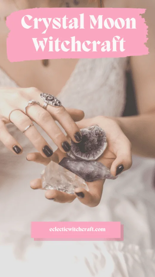 A woman holding different witchy crystals