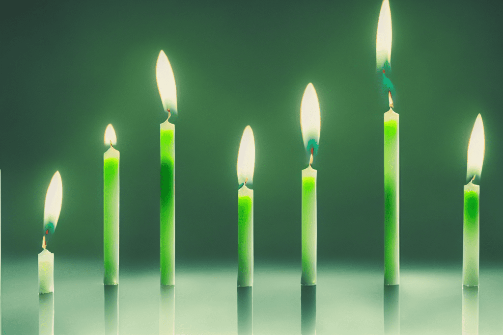 Green chime candles burning