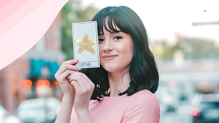 A smiling woman with short black hair, wearing a pink dress, holds up a tarot card featuring a golden star labeled "Star," standing in a softly blurred city background.