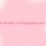 A glowing pink star surrounds the bold affirmation, "I am worthy of abundance and joy." This Lucky Girl wallpaper radiates happiness and serves as a motivational affirmation lock screen or positive energy wallpaper.