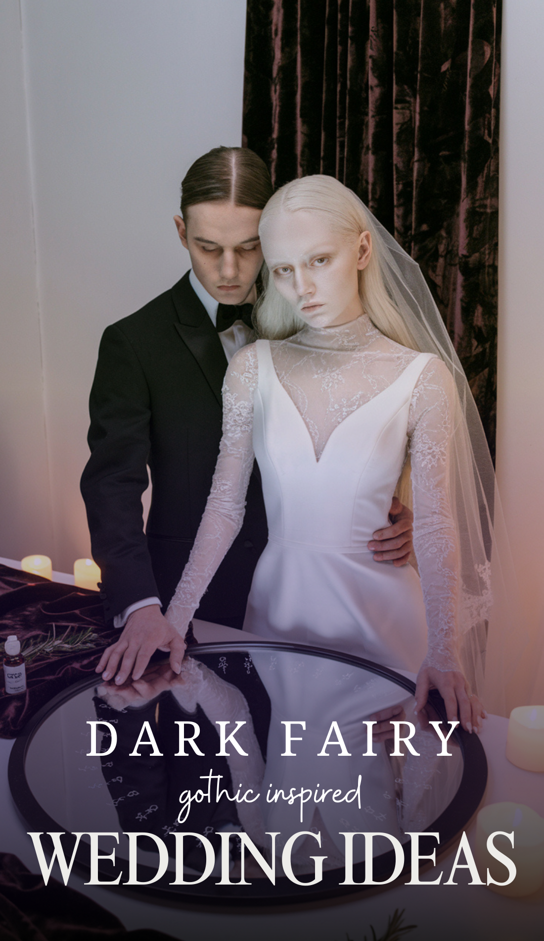 A ghostly pale bride in an elegant high-neck lace gown places her hands on a large black scrying mirror, her reflection almost otherworldly. Her groom, dark-haired and sharp-featured, stands behind her, their energy perfectly balanced between light and shadow. Flickering candles surround them, casting an ethereal glow over this mystical wedding ritual.