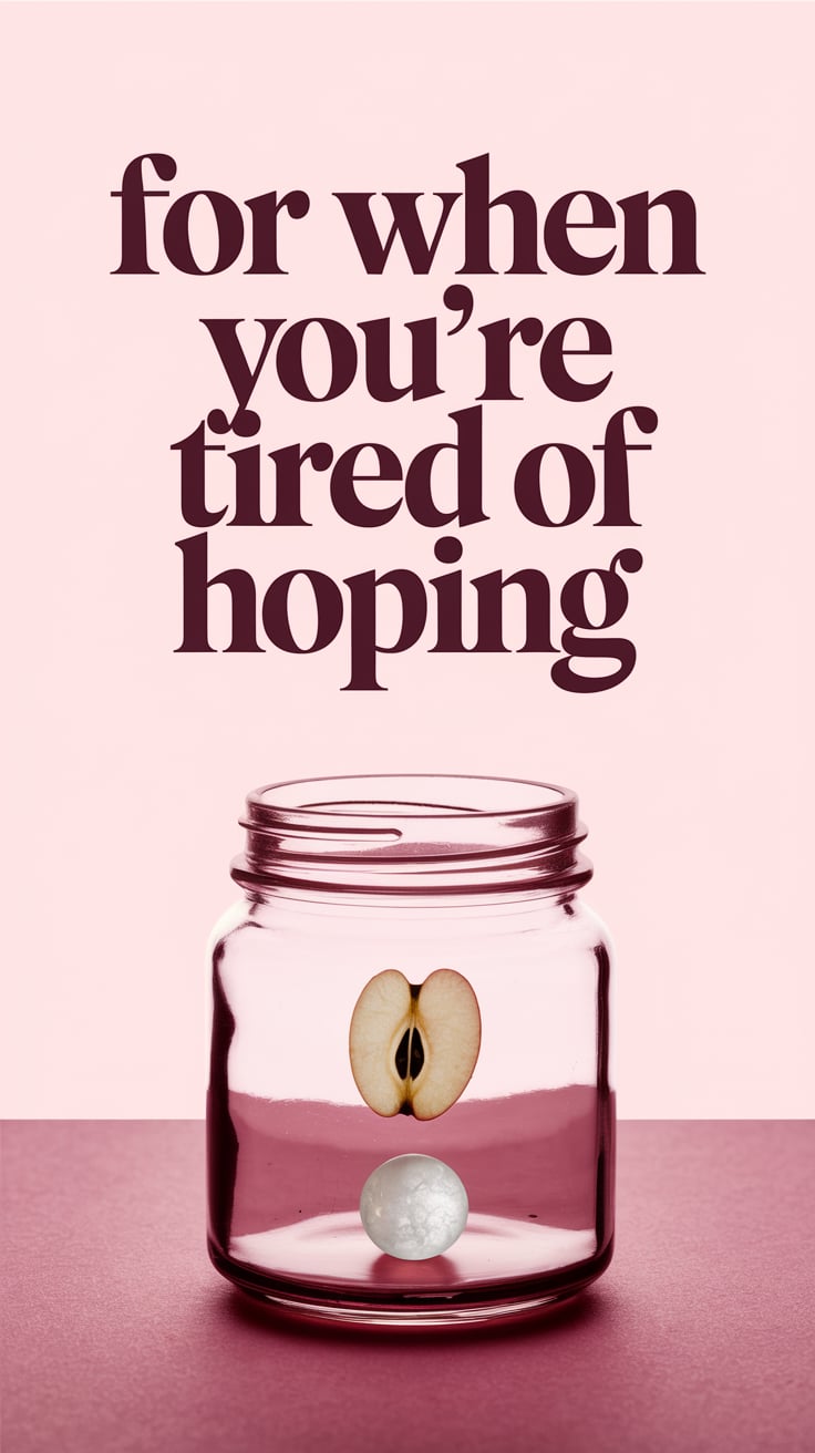 A half-lit jar sits in the lower third of the image, containing a single apple seed and a small moonstone glowing faintly. The upper two-thirds are empty space—blush fading into soft white. The text hovers above, wide-tracked, all lowercase serif, deep plum, so soft it looks like it's been whispered onto the screen.