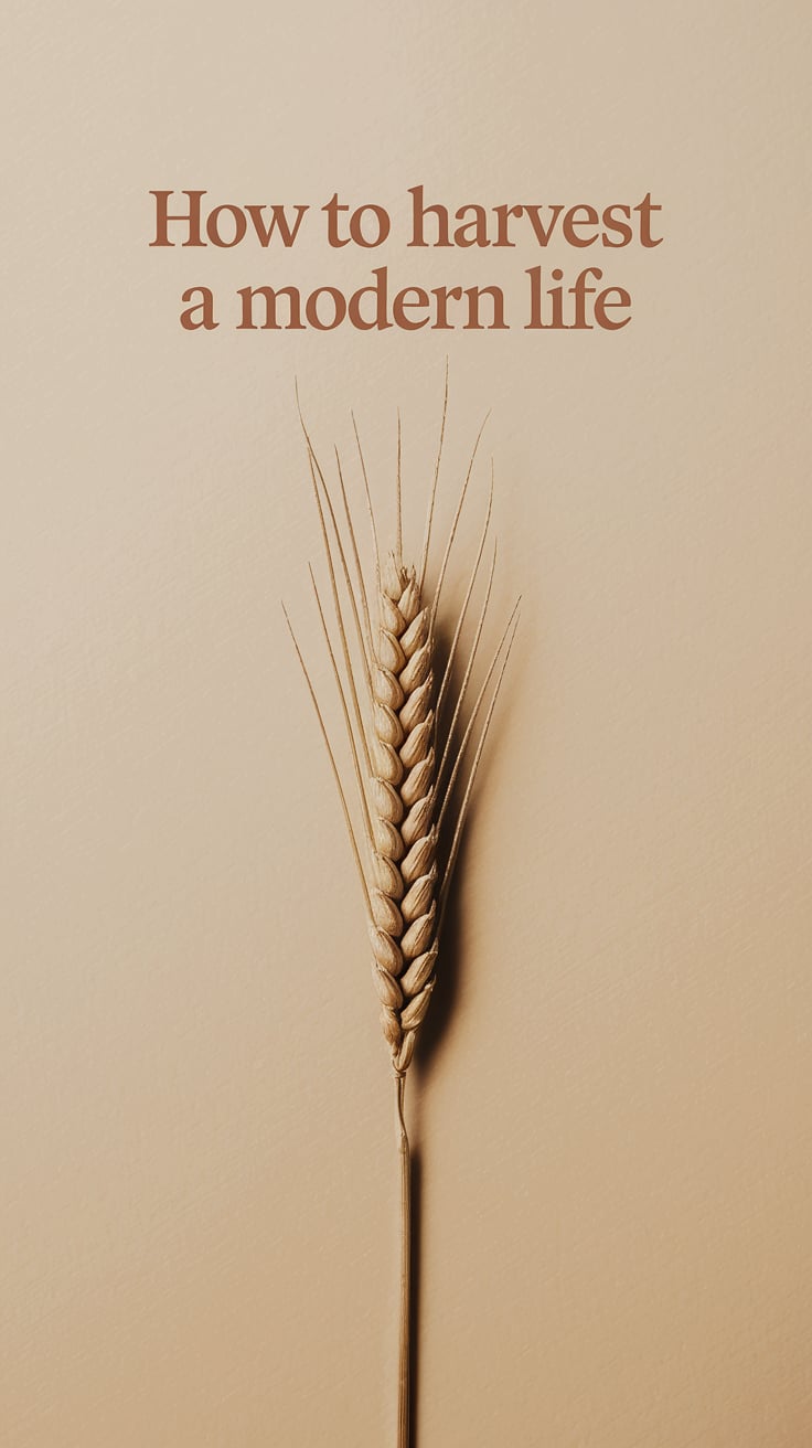 A golden wheat stalk in the center, perfectly vertical, against a smooth parchment beige backdrop. The stalk is detailed, slightly shadowed, almost sculptural in its precision. No other objects. The phrase is in clean, soft-serif font at the top-center in muted ochre, sized boldly enough to anchor the image but not overpower the wheat.